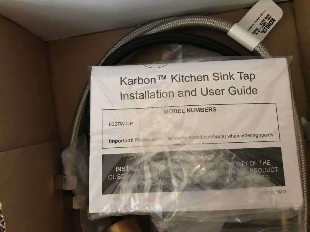 "Kohler Karbon" Trendy articulating stainless steel and carbon-fibre kitchen tap - brand new
