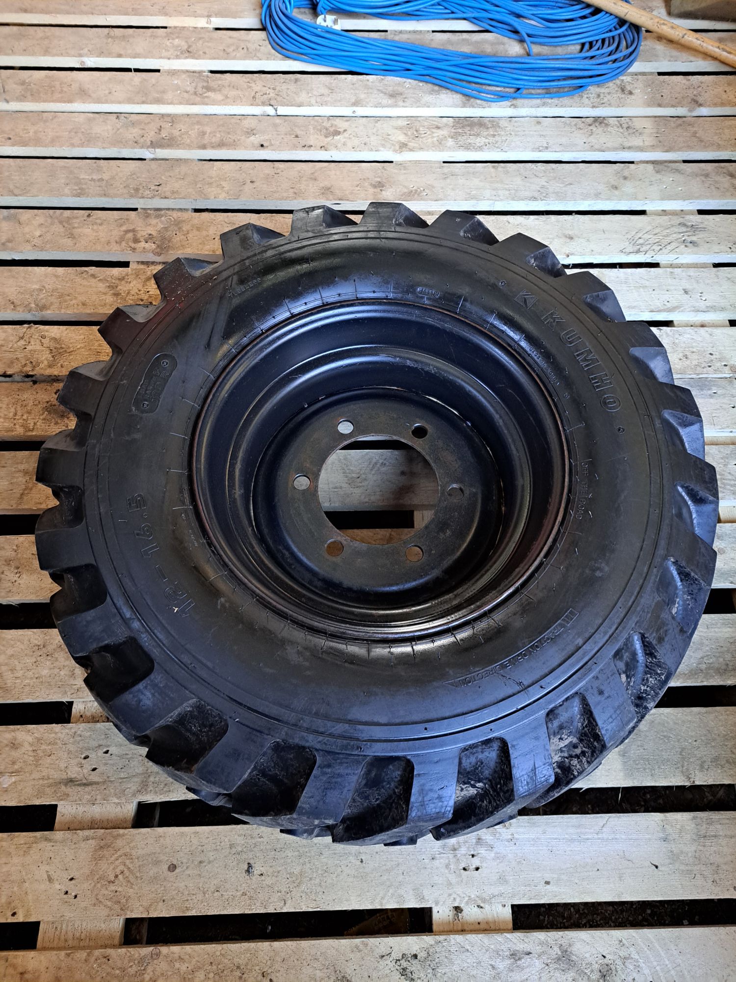 4 Dumper truck wheels and tires.