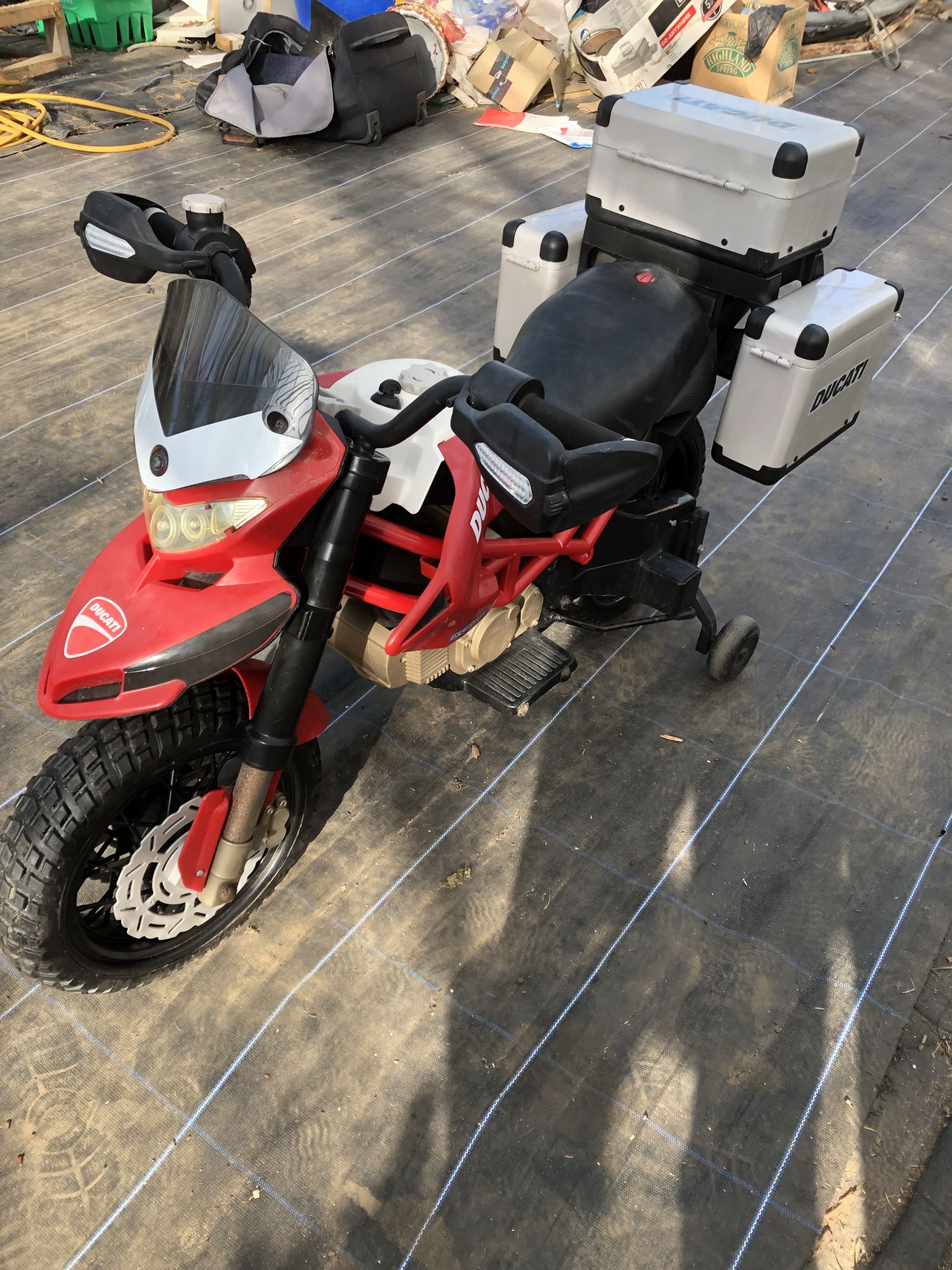 Peg Perego Ducati Enduro 12v Electric ride on bike with storage.