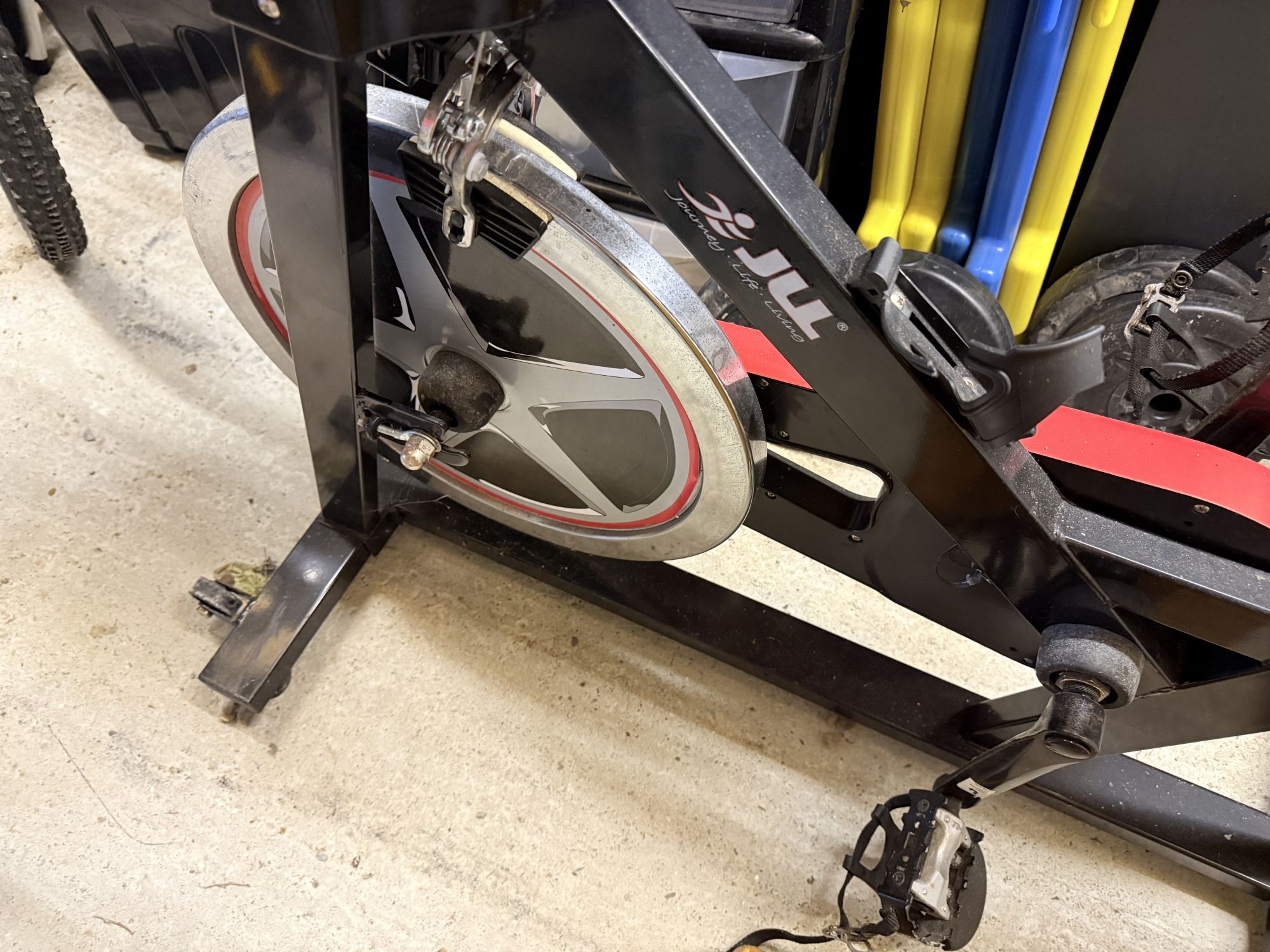 Indoor cycle exercise bike with flywheel