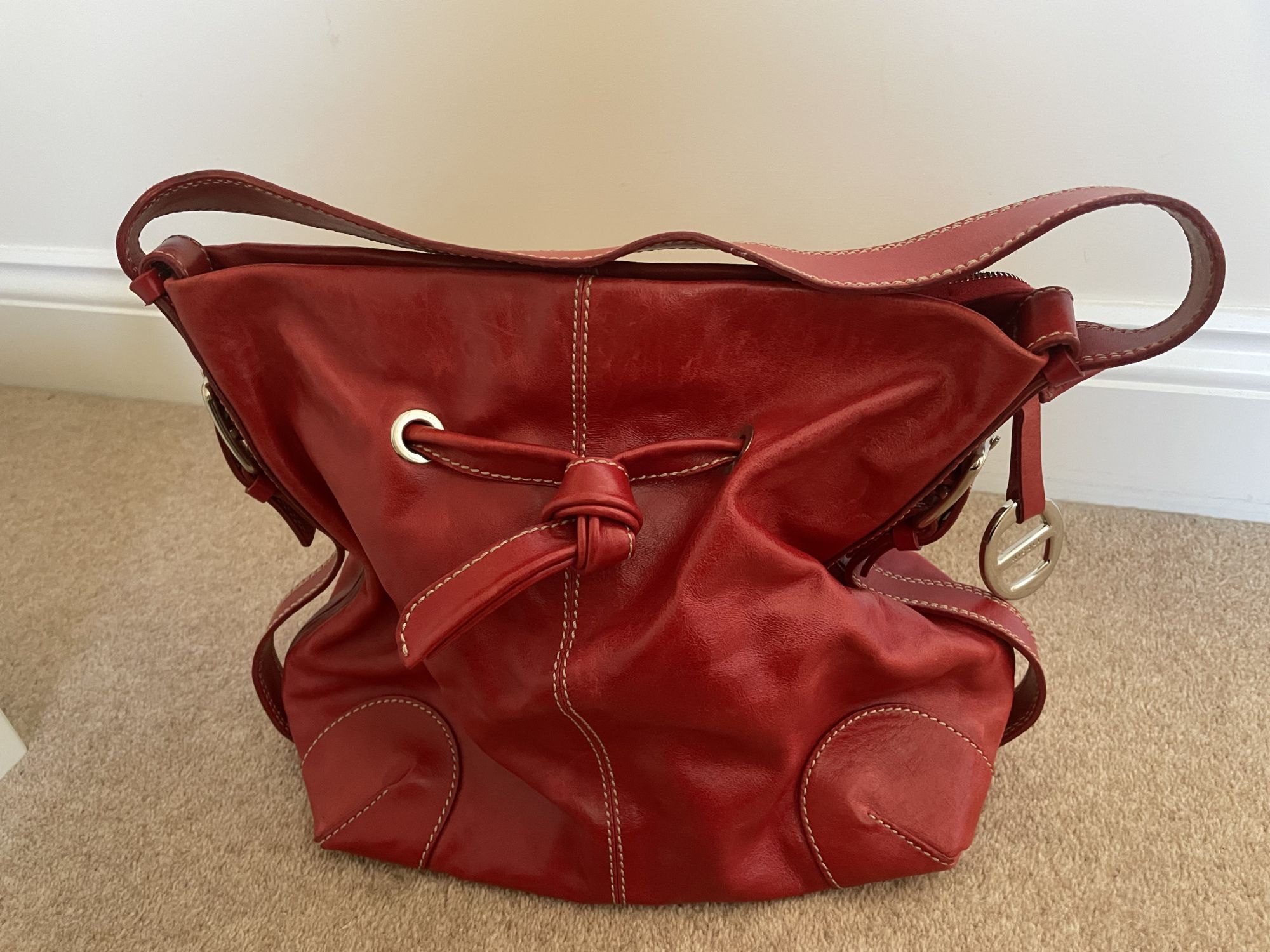Red soft leather handbag