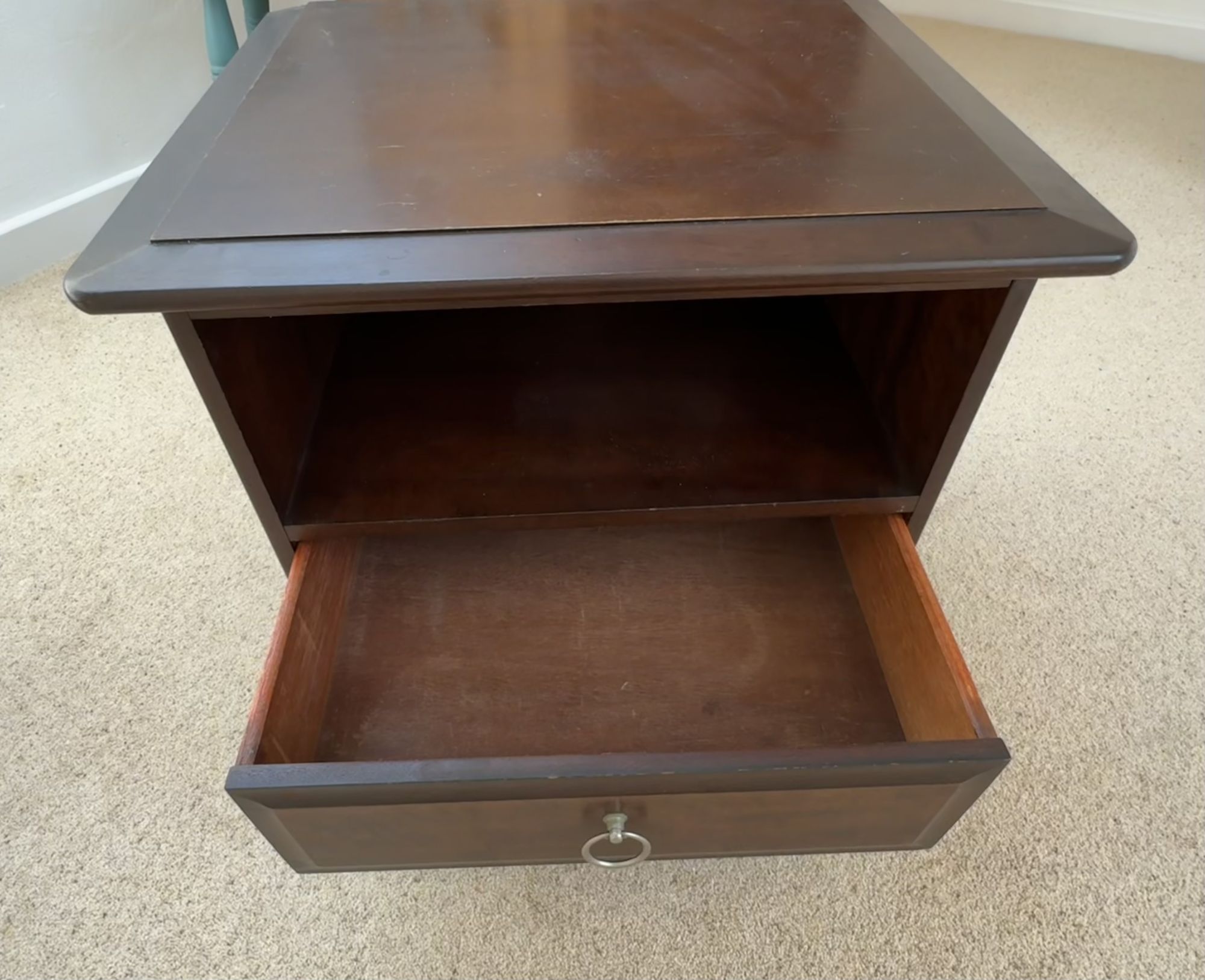 Small wooden unit with drawer