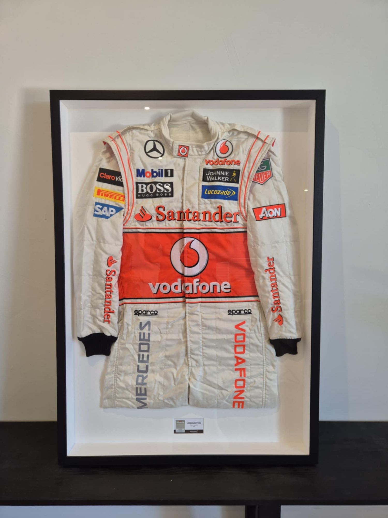 Framed 2013 Jenson Button McLaren F1 Race Suit