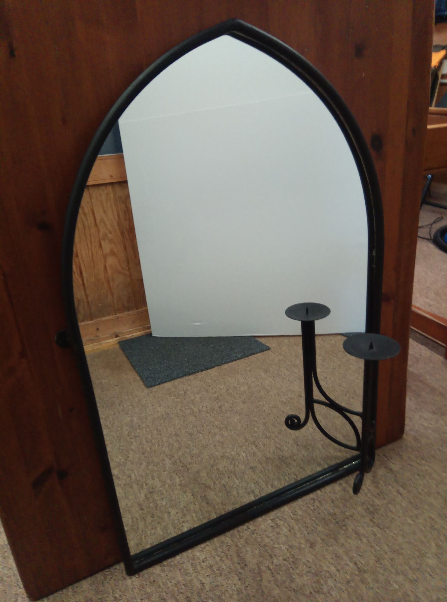 Mirror with candle holder.