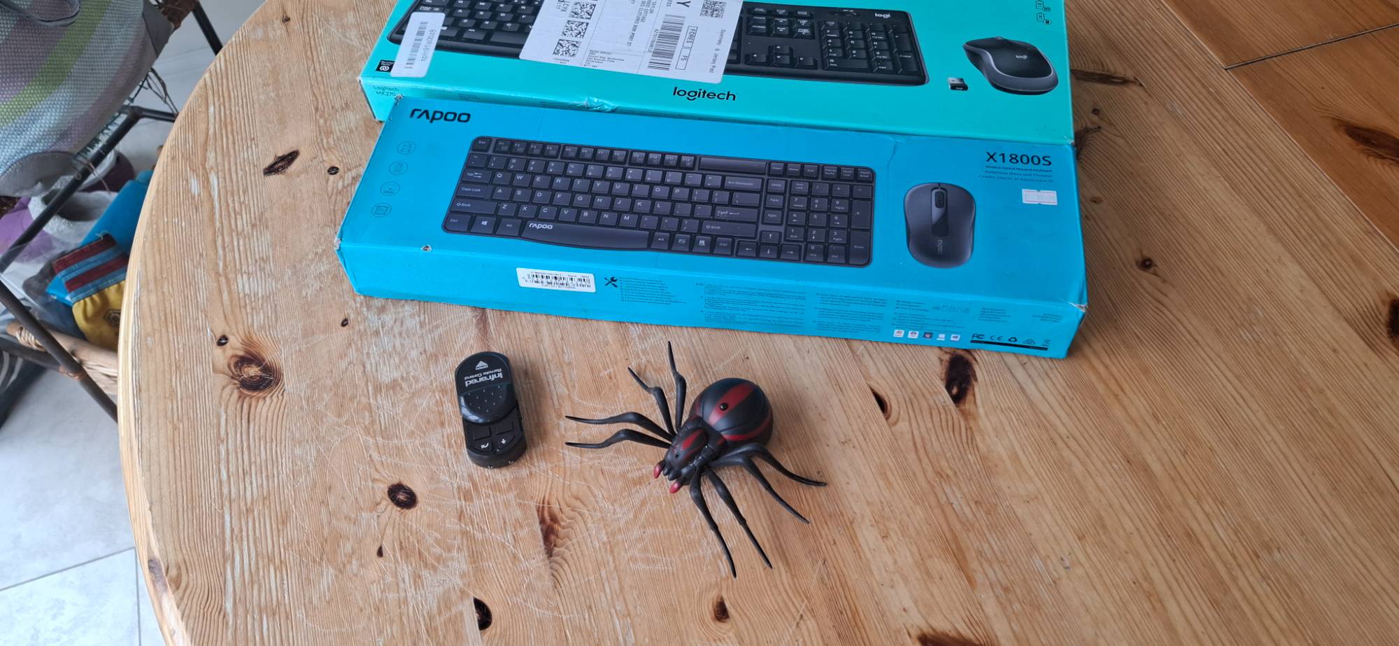 2 wireless keyboard and mouse sets and a remote controlled spider