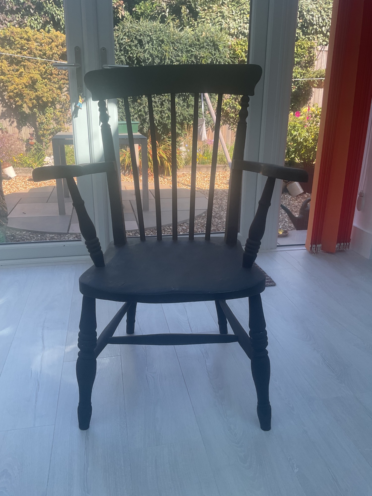 1 Wicker chair, 1 old wooden chair.